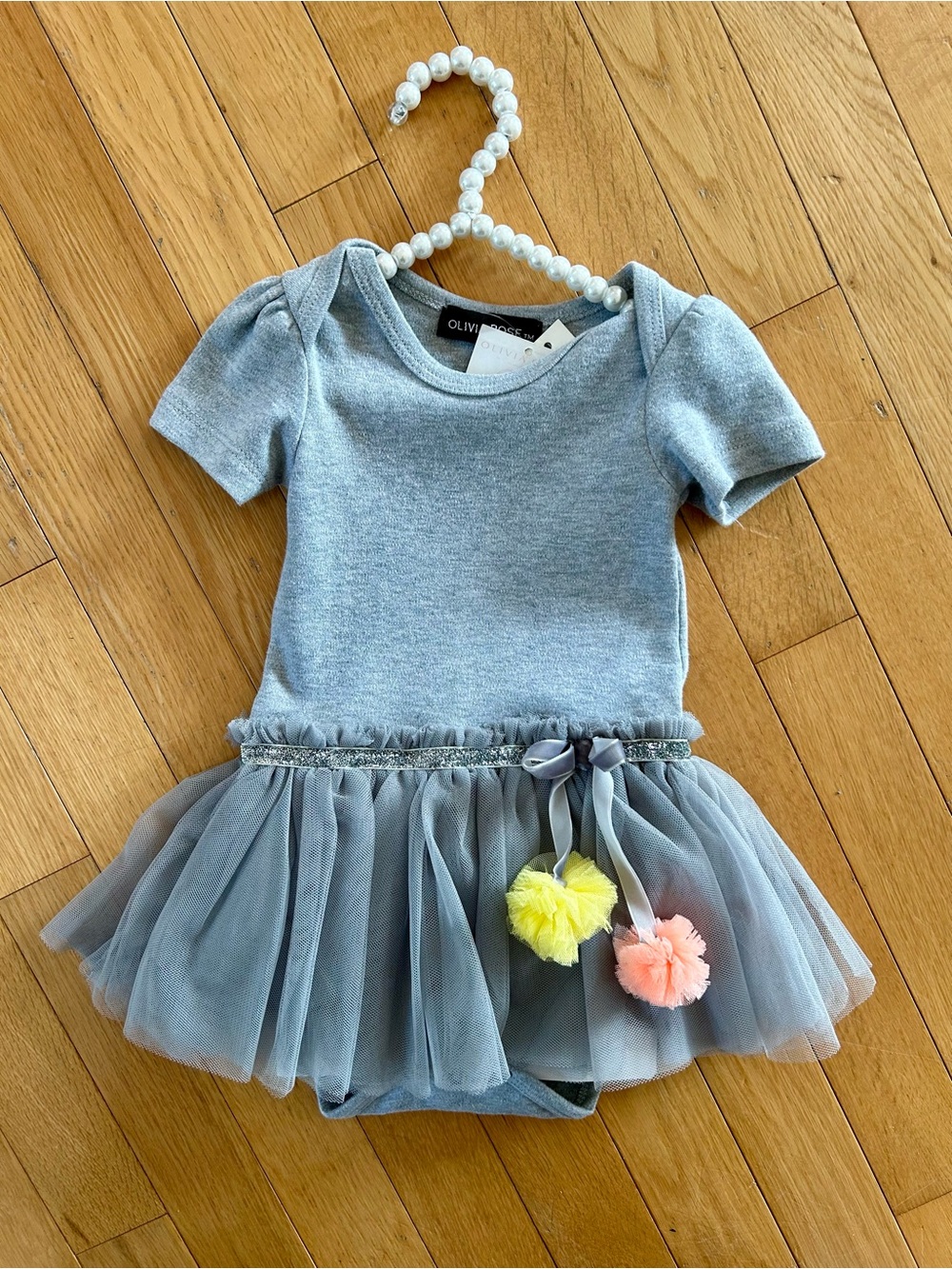 Olivia Rose Grey Knit Tutu Dress with Pom-Pom accent.